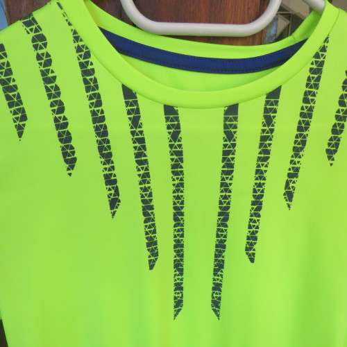 Neon yellow short sleeve sport T-shirt for boy 13 to 14 year old. By MAXED. As new.