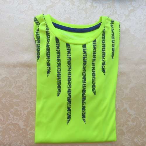 Neon yellow short sleeve sport T-shirt for boy 13 to 14 year old. By MAXED. As new.