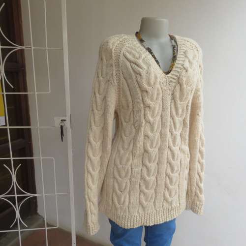 Bulky rich cream double knit long cable knit pullover sweater. Size 36/12. New condition.