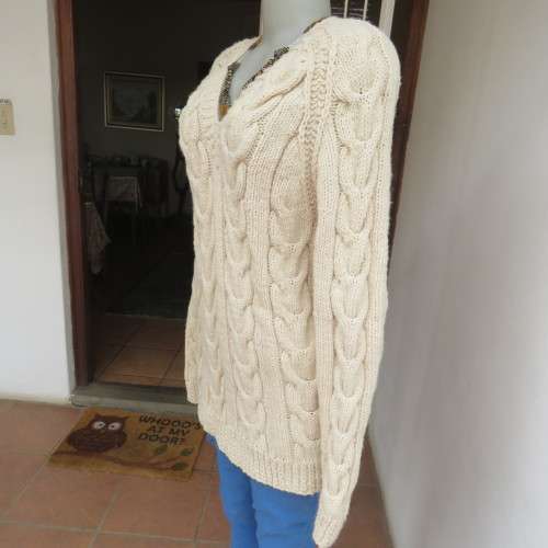 Bulky rich cream double knit long cable knit pullover sweater. Size 36/12. New condition.