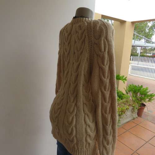 Bulky rich cream double knit long cable knit pullover sweater. Size 36/12. New condition.