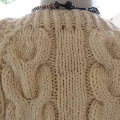 Bulky rich cream double knit long cable knit pullover sweater. Size 36/12. New condition.