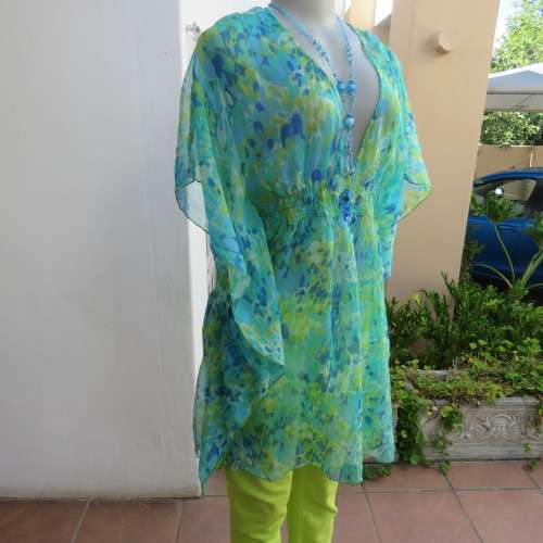 Cheerful sheer polyester long loose top in greens and blue tasteful patterns. Size 40/16. As new