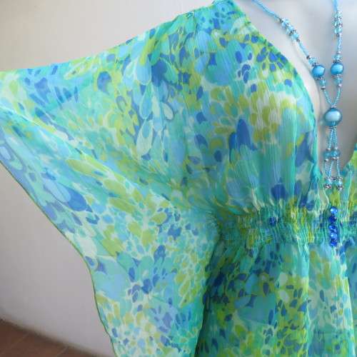 Cheerful sheer polyester long loose top in greens and blue tasteful patterns. Size 40/16. As new