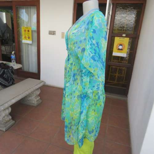 Cheerful sheer polyester long loose top in greens and blue tasteful patterns. Size 40/16. As new