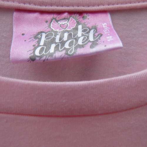 Pretty carnation pink capped sleeve slip over top with asymmetrical seamline. For 14 to 15 yr old.