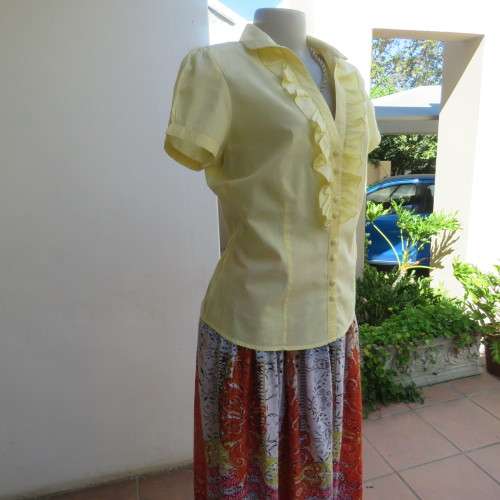 Feminine lemon yellow button down capped sleeve top with frilled front.Open round end collar.Size 38