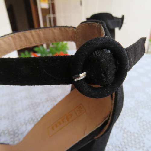 As new black block heel shoes with ankle straps and open toes. By MRP in size 3
