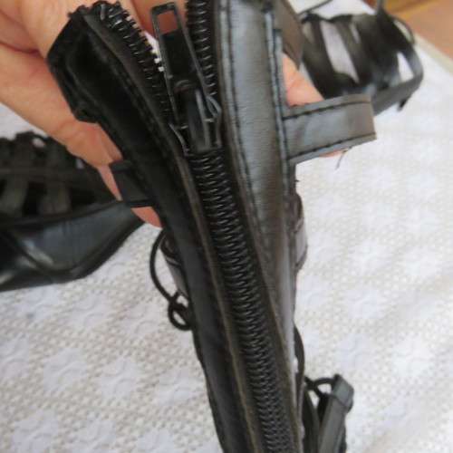 As new knee high lace up stilettos in black. Zip at back.By Boity x LEGIT size 7.