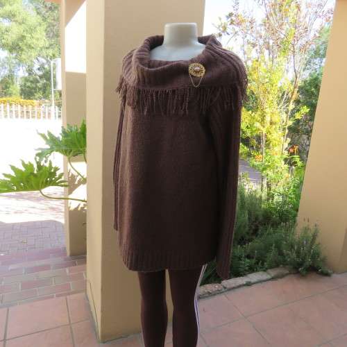 Fabulous acrylic doubleknit slip over cardigan in golden brown with some shine.Size 42/18. As new