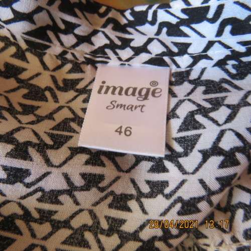 Trendsetting slip over top in black and white small patterns.Size 46/22 by IMAGE.100% viscose.As new