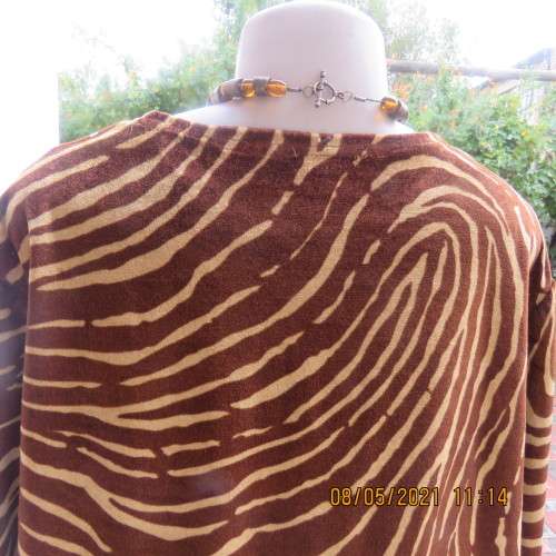 Warm polyester velvet animal print golden brown and caramel long sleeve slip over top.Size 42/18