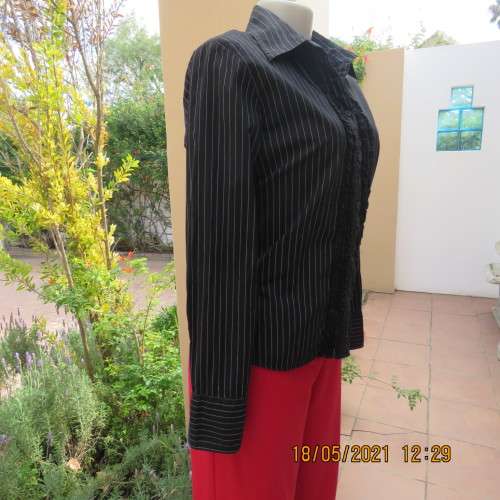 Black polycotton long sleeve shirt with white stripes, Frilled button down front.Size38/14