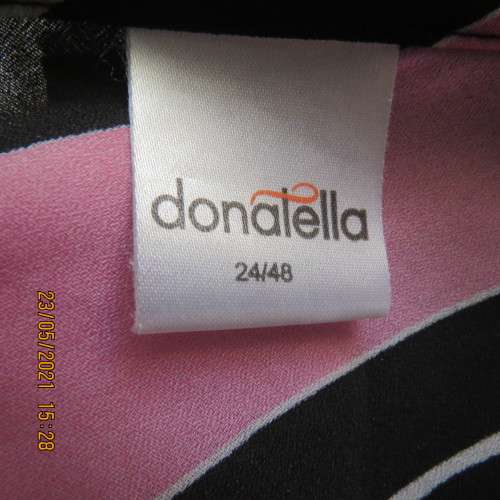 Get noticed in this top with diagonal patterned lines in pinks/black and white. By DONATELLA size 48