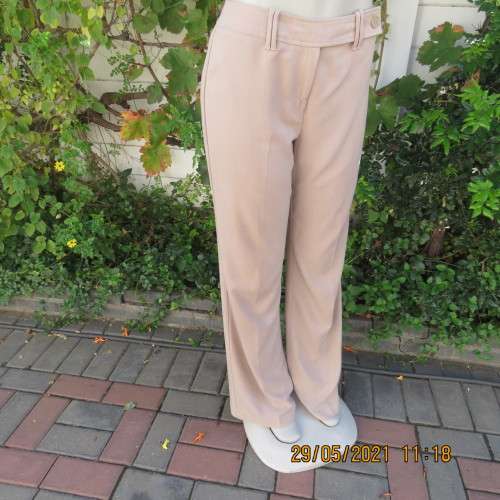 Elegant latte beige pants from WOOLWORTHS size 34/10 with space.Straight legs.Good condition.