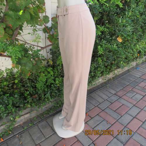 Elegant latte beige pants from WOOLWORTHS size 34/10 with space.Straight legs.Good condition.