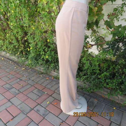 Elegant latte beige pants from WOOLWORTHS size 34/10 with space.Straight legs.Good condition.