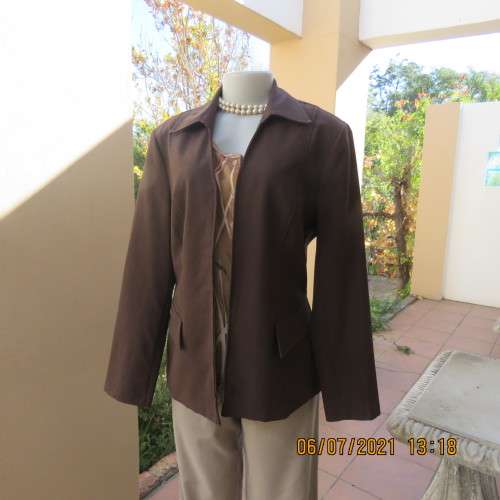 Choc brown zip-up jacket tailored for sophistication. Fully lined.By OASIS size 38/14.New condition.