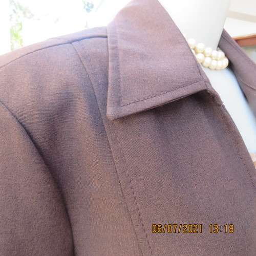 Choc brown zip-up jacket tailored for sophistication. Fully lined.By OASIS size 38/14.New condition.