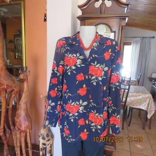High quality AREZZO long sleeve top in navy with red roses/green leaves.Size 40/16.As new