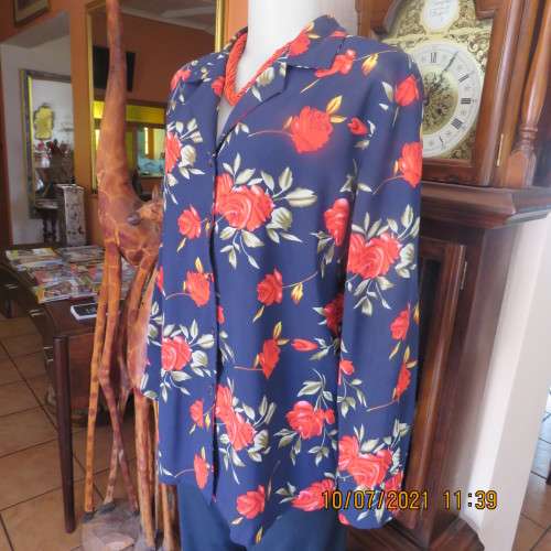 High quality AREZZO long sleeve top in navy with red roses/green leaves.Size 40/16.As new