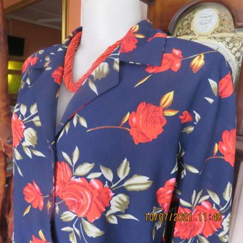 High quality AREZZO long sleeve top in navy with red roses/green leaves.Size 40/16.As new