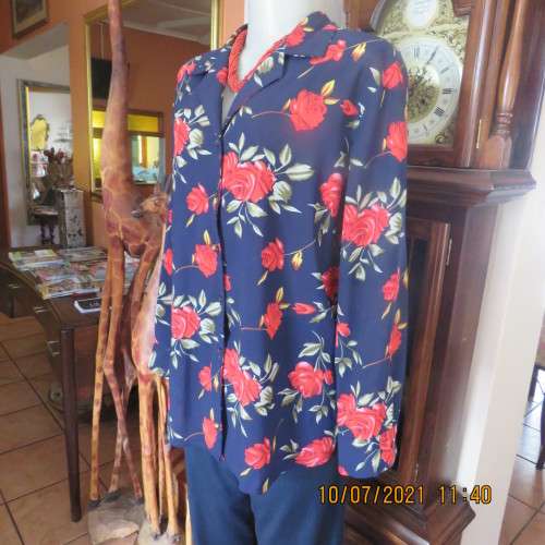 High quality AREZZO long sleeve top in navy with red roses/green leaves.Size 40/16.As new