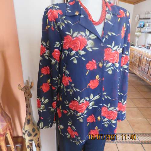 High quality AREZZO long sleeve top in navy with red roses/green leaves.Size 40/16.As new