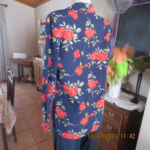 High quality AREZZO long sleeve top in navy with red roses/green leaves.Size 40/16.As new