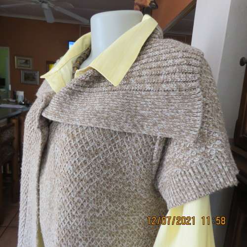 Warm light brown and cream mottled open capped sleeve cardigan.One button.By MILADY`S.Size38 to 40