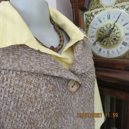 Warm light brown and cream mottled open capped sleeve cardigan.One button.By MILADY`S.Size38 to 40