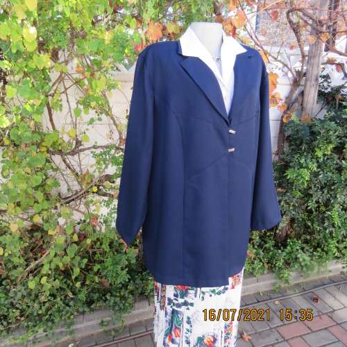 Smart navy DONNA CLAIRE long sleeve jacket size 48/24 in heavy polyester. New condition.