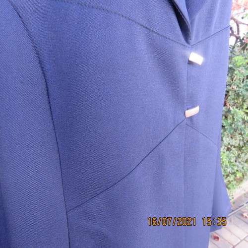 Smart navy DONNA CLAIRE long sleeve jacket size 48/24 in heavy polyester. New condition.
