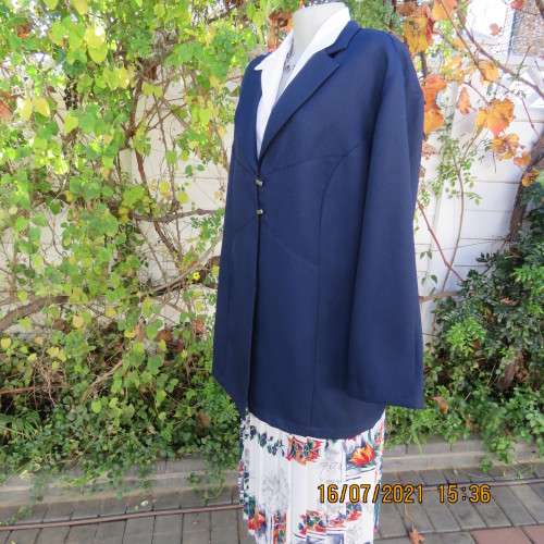 Smart navy DONNA CLAIRE long sleeve jacket size 48/24 in heavy polyester. New condition.