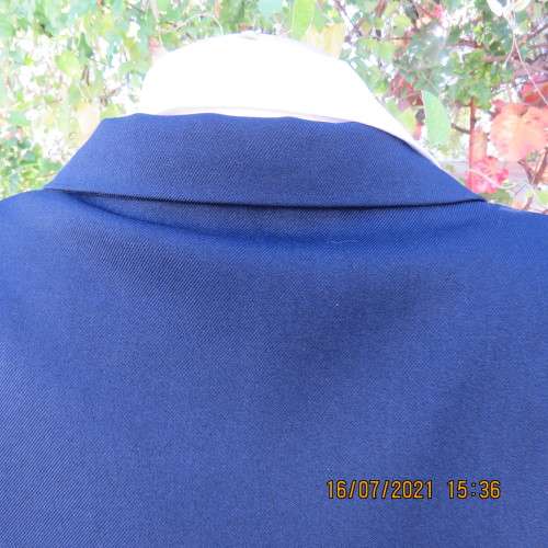 Smart navy DONNA CLAIRE long sleeve jacket size 48/24 in heavy polyester. New condition.