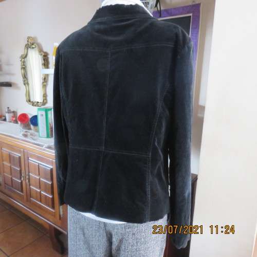 Stunning black velveteen long sleeve fully lined jacket by Truworths size 40 to 42.In stretch cotton