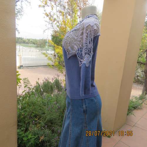 Dainty cobalt blue polycotton knit button down top.Cotton lace yokes and shoulders.Size 36/12