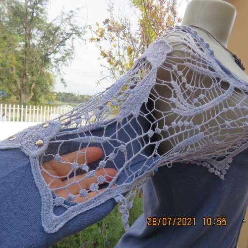 Dainty cobalt blue polycotton knit button down top.Cotton lace yokes and shoulders.Size 36/12