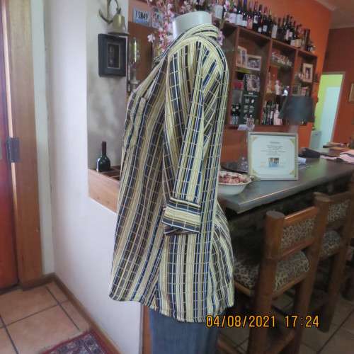 Smart cream,caramel and blue checked short sleeve top size 40 to 42.Viscose/cotton and poly blend.