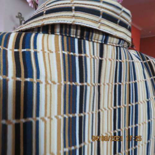 Smart cream,caramel and blue checked short sleeve top size 40 to 42.Viscose/cotton and poly blend.