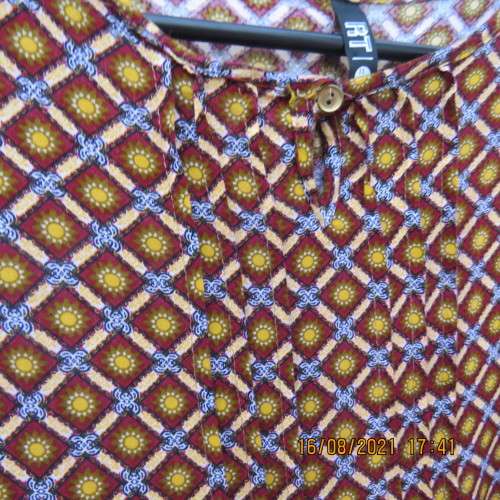 Pretty long sleeve loose  slip over dress in autumn colours.By RT for 11 to 12 yr old. In viscose.