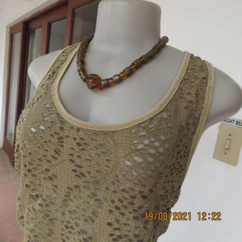 BILLABONG tank style top with mesh look in polyester stretch.Size 38/14. Pale army green.