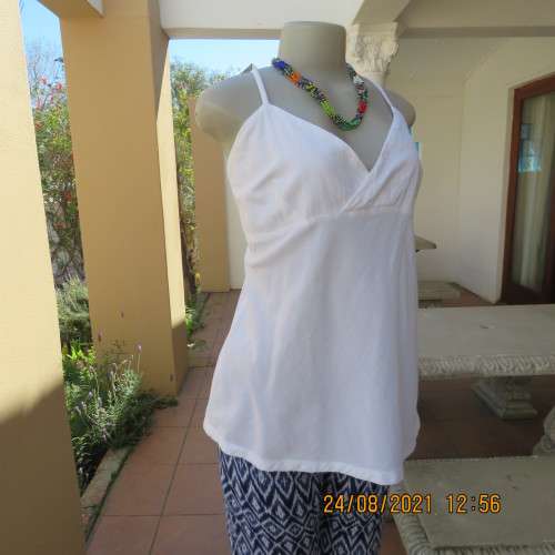 Must have size 44/20 white cotton strappy top.High quality from the USA. By BBC. As new.