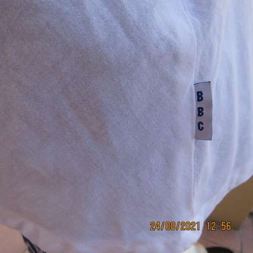 Must have size 44/20 white cotton strappy top.High quality from the USA. By BBC. As new.