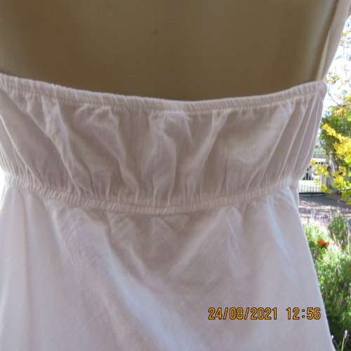 Must have size 44/20 white cotton strappy top.High quality from the USA. By BBC. As new.