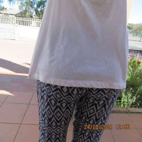 Must have size 44/20 white cotton strappy top.High quality from the USA. By BBC. As new.