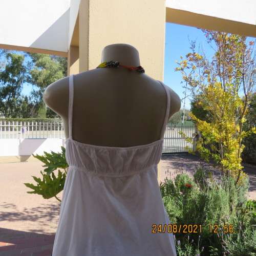Must have size 44/20 white cotton strappy top.High quality from the USA. By BBC. As new.