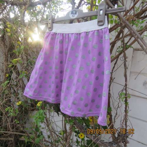 Cute little lilac skirt with wide silver elasticated waistband. By LOLLIPOP for girls 6-7 years old.