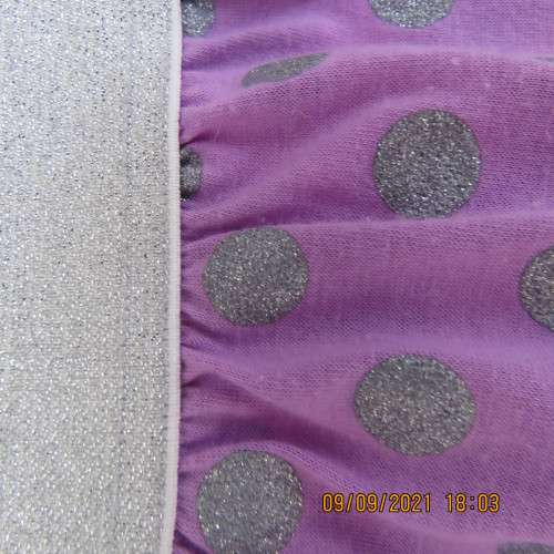 Cute little lilac skirt with wide silver elasticated waistband. By LOLLIPOP for girls 6-7 years old.