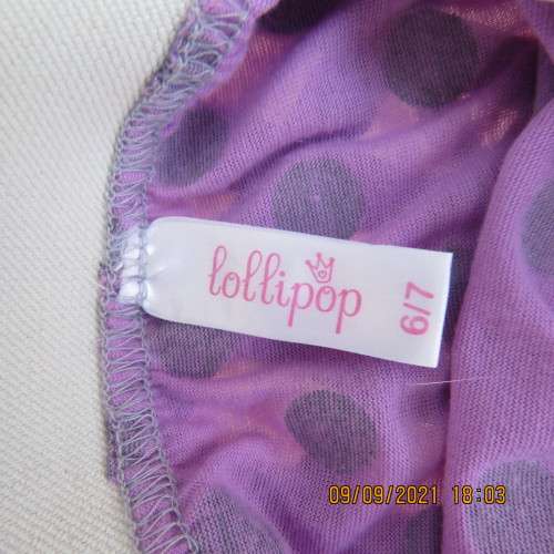 Cute little lilac skirt with wide silver elasticated waistband. By LOLLIPOP for girls 6-7 years old.